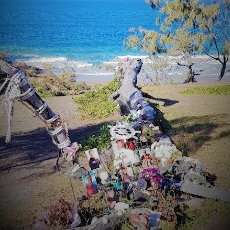 A permanent memorial for the victims will soon be erected to replace this temporary tribute site as work begins Monday morning near 1770. Picture: Stephen Bennett MP