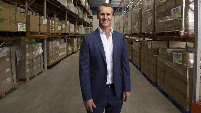 Ellume Health CEO Sean Parsons at his Brisbane warehouse. Picture: Glenn Hunt