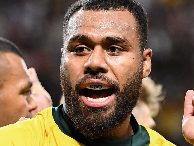 Australia's centre Samu Kerevi celebrates scoring a try during the Japan 2019 Rugby World Cup Pool D match between Australia and Fiji at the Sapporo Dome in Sapporo on September 21, 2019. (Photo by WILLIAM WEST / AFP)