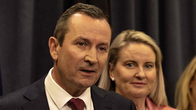 WA Premier Mark McGowan made the shock announcement accompanied by his wife Sarah. Picture: NCA NewsWire / Colin Murty