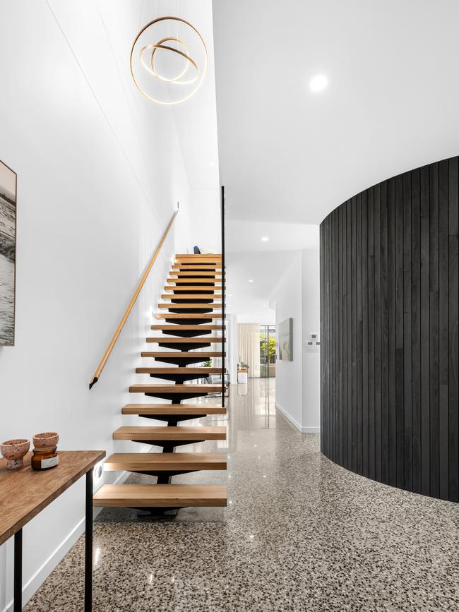 Floating staircase and mural set this home apart in Reservoir.
