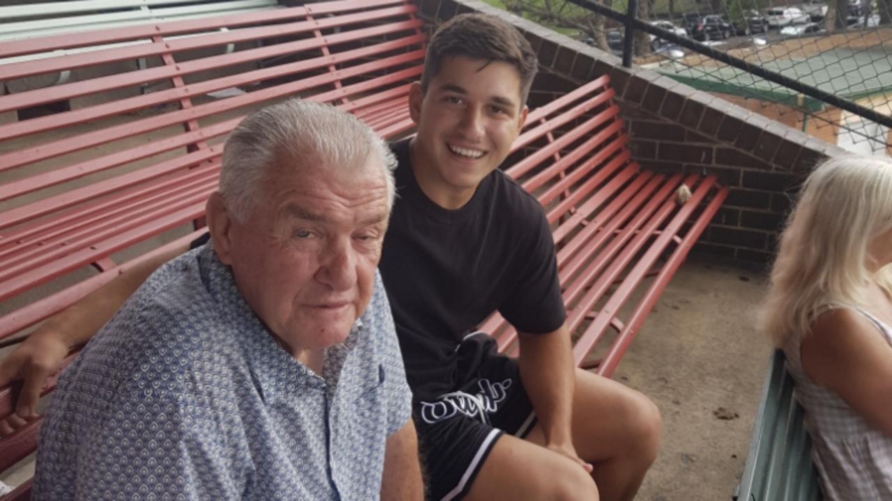 Souths legend George Piggins with young Rabbitohs hooker Peter Mamouzelos.