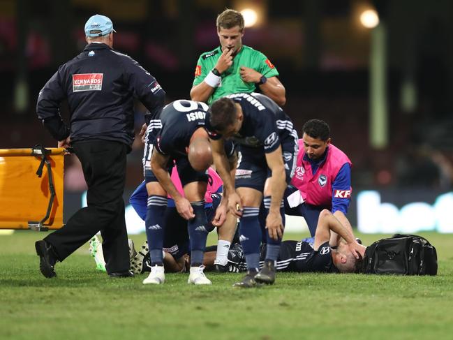SYDNEY, AUSTRALIA - APRIL 06: Terry Antonis of the Victory lays down injured during the round 24 A-League match between Sydney FC and the Melbourne Victory at Sydney Cricket Ground on April 06, 2019 in Sydney, Australia. (Photo by Mark Metcalfe/Getty Images)