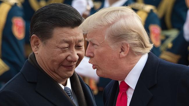 China's President Xi Jinping (left) greets US President Donald Trump in Beijing in November last year. Photo: AFP