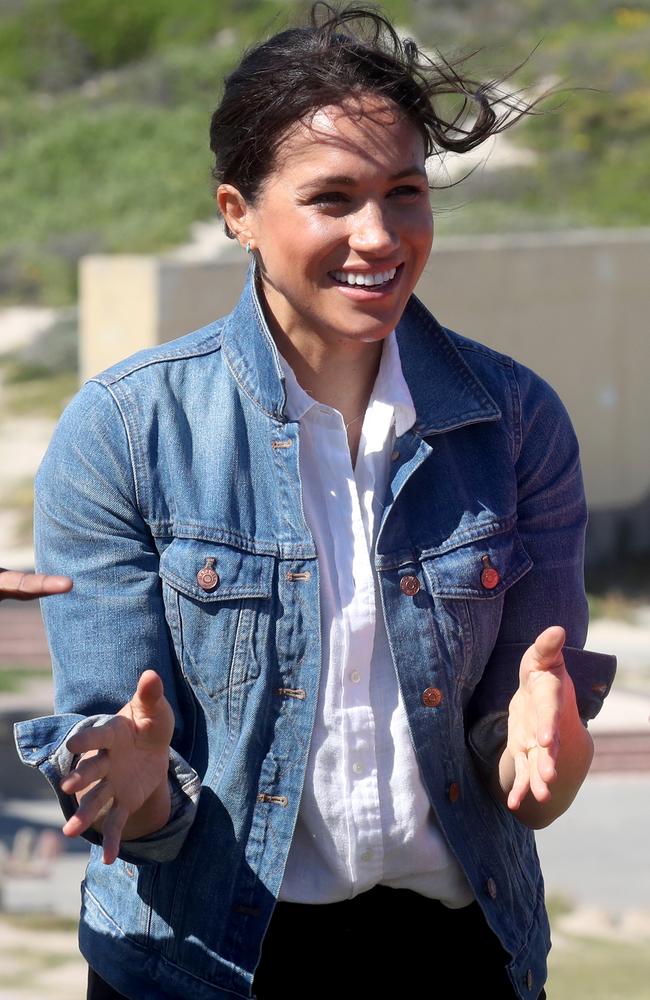 Meghan wore a natural look for a visit to Waves for Change, an NGO, at Monwabisi Beach with Prince Harry. Picture: Chris Jackson - Pool/Getty Images