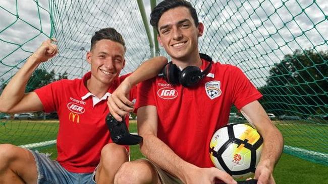 Adelaide United has selected Jamie O'Doherty (right) to represent it in the E-League. His brother Jordan plays for Adelaide United's A-League team.