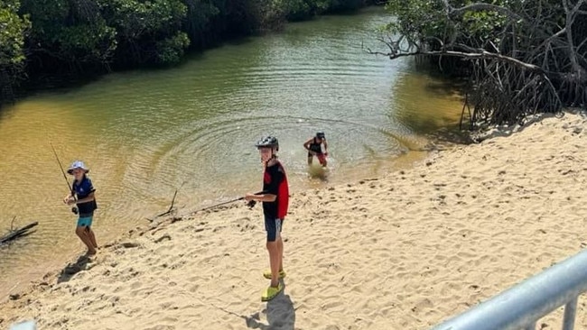 Children fishing in Deep Creek, from where a crocodile was trapped and removed. Picture: Supplied.