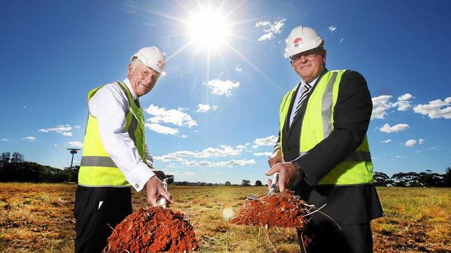 NSW Health Minister Brad Hazzard and Tweed MP Geoff Provest turn the first sod of dirt at the new Tweed Valley Hospital site. Picture: Scott Powick