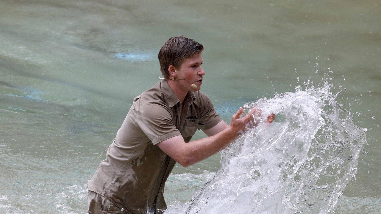 Mr Irwin didn’t hesitate to jump in the water with the crocodiles to entertain the crowd. Picture: NCA NewsWire/Tertius Pickard