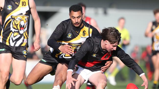 Elijah Reardon (Tigers) and Ethan Hubbard (North Launceston) do battle on Saturday. Picture: Nikki Davis-Jones