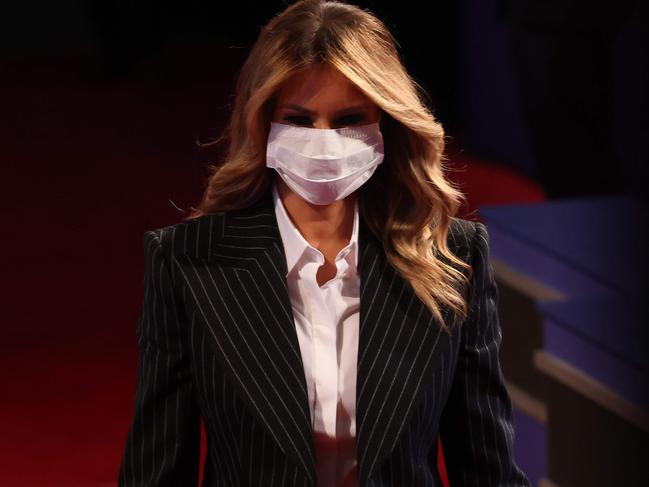 (FILES) In this file photo taken on September 28, 2020, US First lady Melania Trump arrives to the presidential debate between President Trump and Biden at the Health Education Campus of Case Western Reserve University in Cleveland, Ohio. - US President Donald Trump, 74, was forced off the campaign trail on October 2, 2020, after testing positive for Covid-19. Trump announced on Twitter that he and First Lady Melania Trump, 50, had tested positive and were going into quarantine. (Photo by WIN MCNAMEE / GETTY IMAGES NORTH AMERICA / AFP)