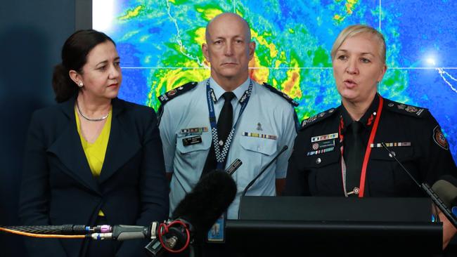 Eye of the storm: Katarina Carroll briefs the media with Premier Annastacia Palaszczuk and deputy police commissioner Steve Gollschewski after Cyclone Debbie crossed the coast in 2017.