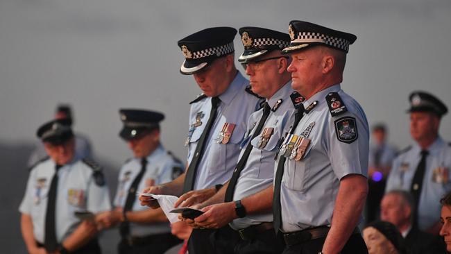 National Police Remembrance Candlelight Vigil 2023 at the Rockpool, Townsville. Acting Chief Superintendent Chris Lawson, Acting Assistant Commissioner Chris Hodgman and Acting Deputy Commissioner Kevin Guteridge. Picture: Evan Morgan