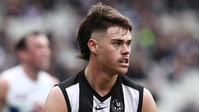 Pie mid concussed again as AFL ponders training changes