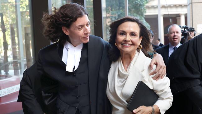 Sue Chrysanthou SC hugs Lisa Wilkinson as they emerge from court in Sydney. Picture: Don Arnold/Getty Images