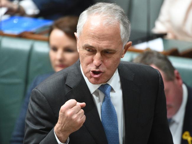 Dark days are over … Malcolm Turnbull during Question Time yesterday. Picture: AAP Image/Mick Tsikas