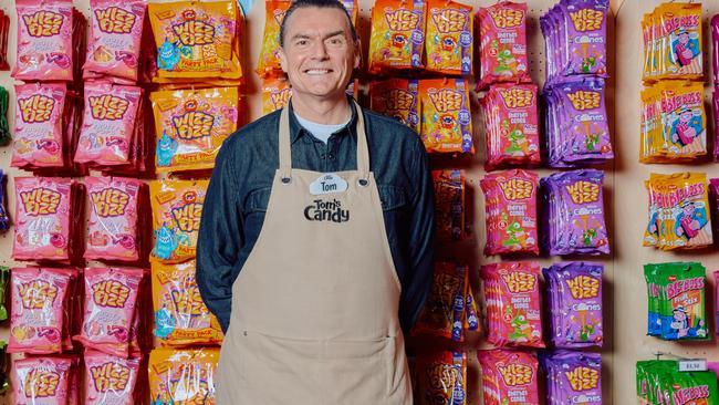 Tom Campbell at his new candy store at Prahran Market.