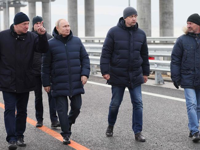 Mr Putin was flanked by Deputy Prime Minister Marat Khusnullin, left. Picture: AFP