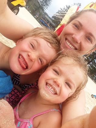 Hannah Gray with her children Angus and Mabel. the family was on board the Jetstar flight that turned back to Melbourne amid lightning strikes.