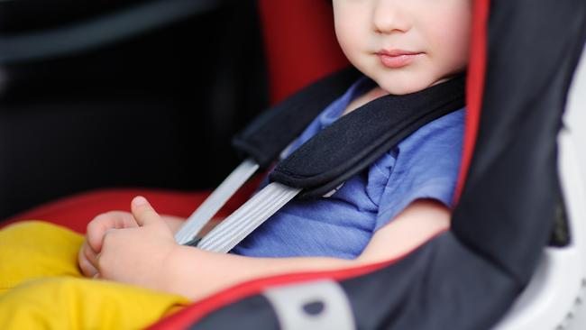 Portrait of a toddler sitting in car seat. Picture: iStock