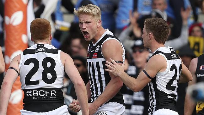 Billy Frampton celebrates a goal for the Port Adelaide Magpies in the SANFL. Picture: SARAH REED