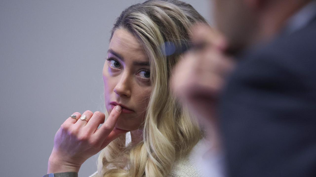 Amber Heard listens on in court. Picture: AFP