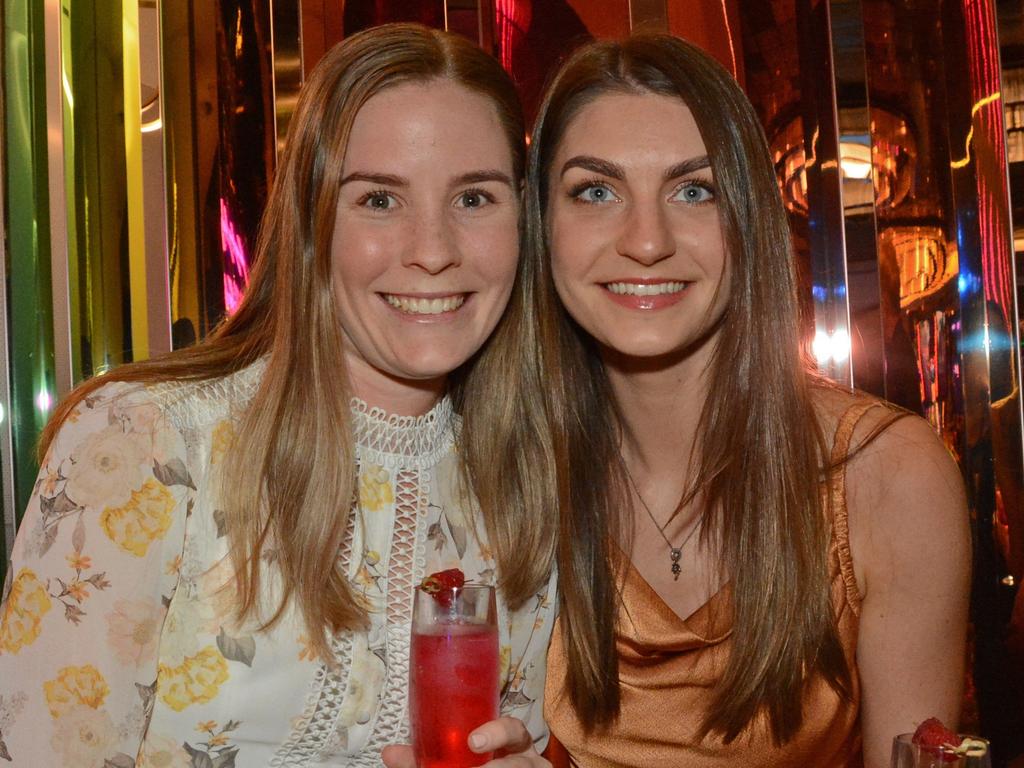 Kaitlyn Schneider and Caitlin Fraser at the YPGC cocktail party in the Atrium Bar, The Star Gold Coast. Picture: Regina King.