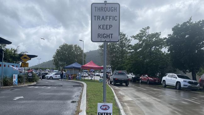 The PCYC polling booth in Airlie Beach had its traffic split between the AFL carnival and voters. Picture: Estelle Sanchez