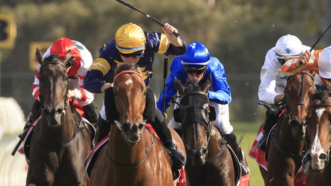 Tommy Berry on Outrageous wins the Festival Stakes. Picture: Getty Images