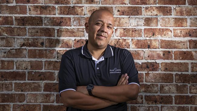 Footprints case manager Jorge Ayala, 39, is in charge of Assistance in Care and Housing programs, dealing with decluttering. Picture: Mark Cranitch