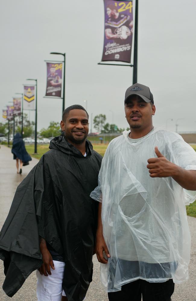 William Dempsey and Baeden Chong had their ponchos ready to go on a wet night in Townsville. Picture: Blair Jackson