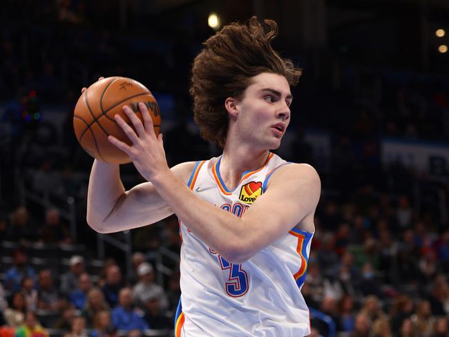 OKLAHOMA CITY, OK - DECEMBER 18: Josh Giddey #3 of the Oklahoma City Thunder passes the ball during the game against the LA Clippers on December 18, 2021 at Paycom Arena in Oklahoma City, Oklahoma. NOTE TO USER: User expressly acknowledges and agrees that, by downloading and or using this photograph, User is consenting to the terms and conditions of the Getty Images License Agreement. Mandatory Copyright Notice: Copyright 2021 NBAE (Photo by Zach Beeker/NBAE via Getty Images)