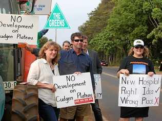 Tweed Shire Council Mayor Katie Milne protests against the hospital site with Team Relocate's James and Hayley Paddon. Picture: Scott Powick