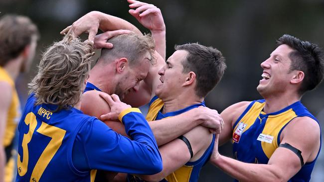 Noble Park celebrate a Shayne Allan a goal against Balwyn. Picture: Andy Brownbill