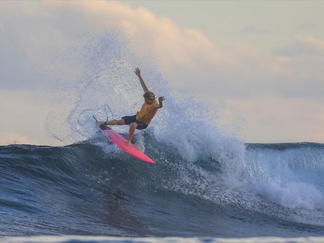 Rico Haybittle surfing