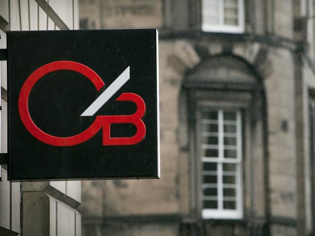 The logo of Clydesdale Bank hangs outside of a branch in Edinburgh, Scotland, on Tuesday, Oct. 11, 2011. Sun Capital, backed by Hugh Osmond, made a 2 billion-pound ($3.1 billion) offer for Clydesdale and Yorkshire bank networks. Photograph: Mike Wilkinson/Bloomberg