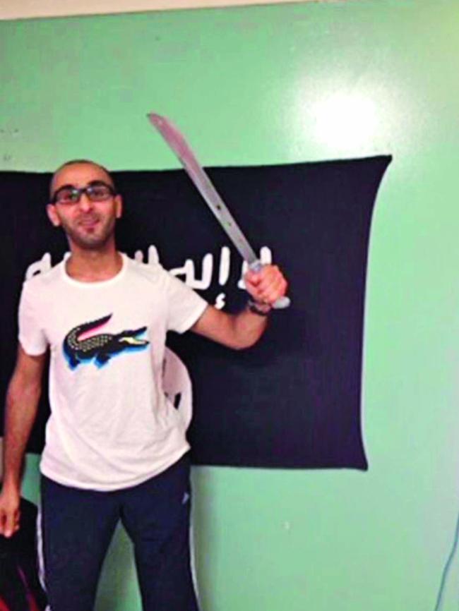 Mohammed Kiad brandishes a knife. Pic: supplied