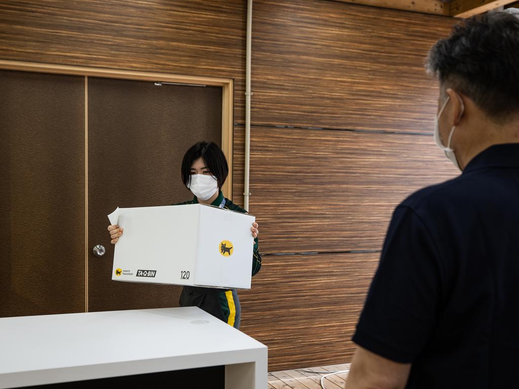 A general view of the courier counter inside the Village Plaza. Photo by Takashi Aoyama/Getty Images)