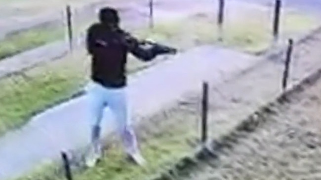 CCTV of masked gunmen firing into the Goldingham St, Tenambit home before 7am on October 16, the day before Maddison Hickson’s trial was set to begin. Picture: Channel 7.