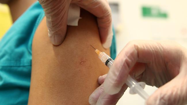 Public health experts are advising people to ensure they have had two doses of measles vaccine, particularly before travelling. Picture: Fiona Goodall Getty Images