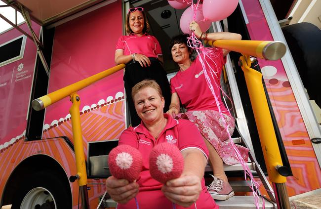 Radiographer Megan Harvey (front) and administrator Natalie Williams and health promoter Debbie Jargoe at the Millie the mobile mammogram screening truck. Picture: Keri Megelus