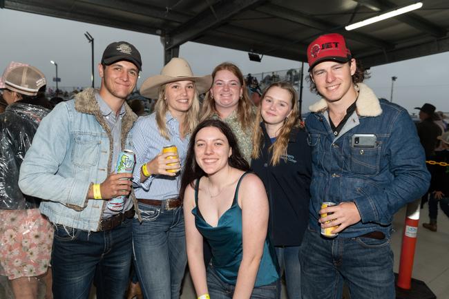 Dan Desbois, Hannah O'Keeffe, Claudia Smith, Chelsea Veitch, Jessica Whiting and Zac Cameron at the PBR Bull Pit Bull Bash at Dittmann Bucking Bulls in Bloomsbury. August 27, 2022. Picture: Michaela Harlow