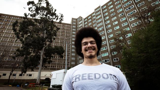 North Melbourne tower resident Ali Abdalla grins after the lockdown comes to an end. Picture: Darrian Traynor/Getty Images.