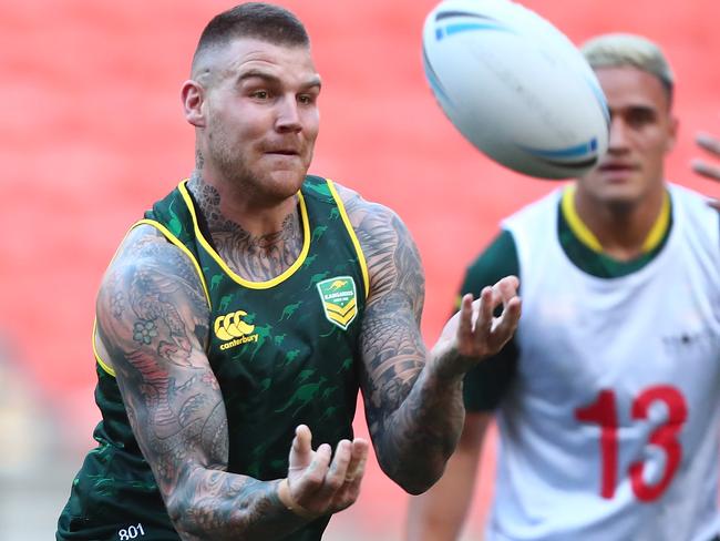 BRISBANE, AUSTRALIA - OCTOBER 11:  Josh Dugan passes during an Australian Kangaroos Rugby League World Cup training session at Suncorp Stadium on October 11, 2017 in Brisbane, Australia.  (Photo by Chris Hyde/Getty Images)