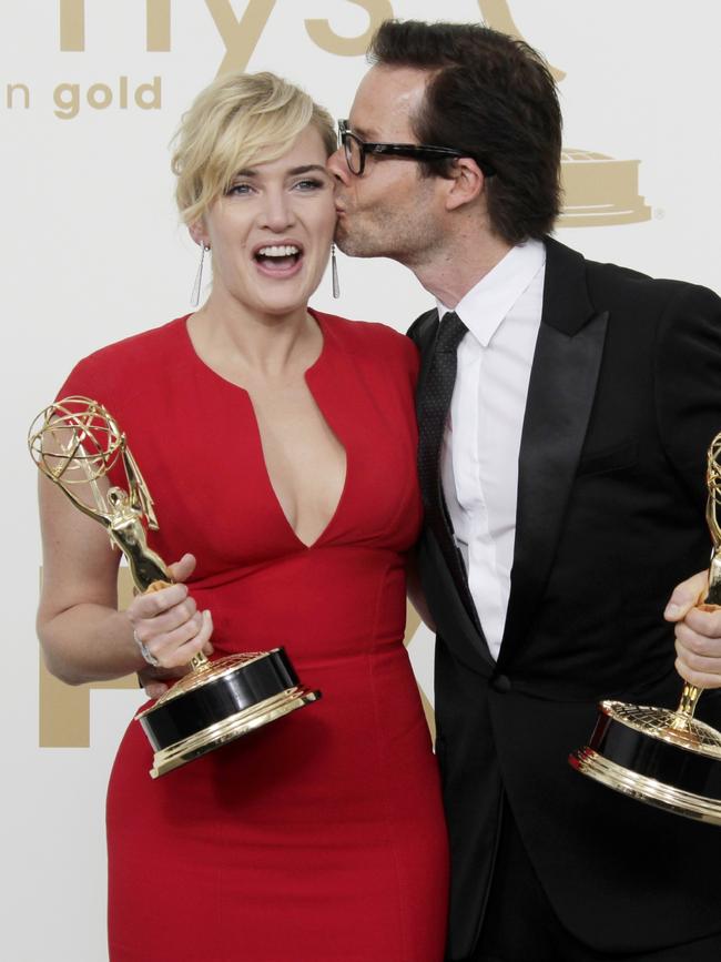 Kate Winslet and Guy Pearce at the 2011 Emmys, where they both won awards for their performances in Mildred Pierce. Picture: AFP