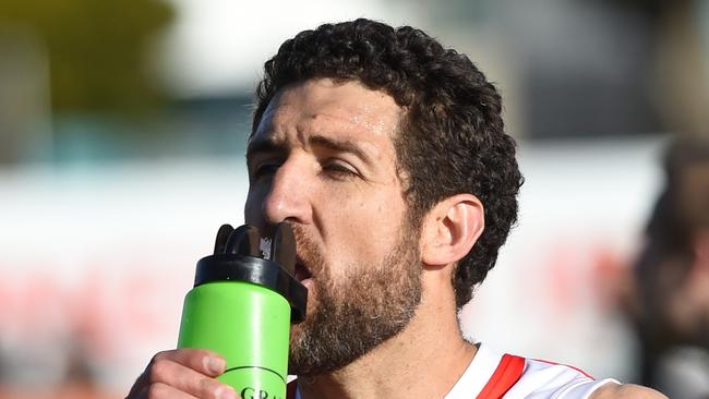 Nepean football league Grand Final: Sorrento v Frankston at Frankston Park. The Sharks went into the grand final as favourites and delivered another flag with a comfortable win over the Bombers. Sorrento coach Troy Schwarze grabs a drink at three quarter time. Picture: AAP/ Chris Eastman