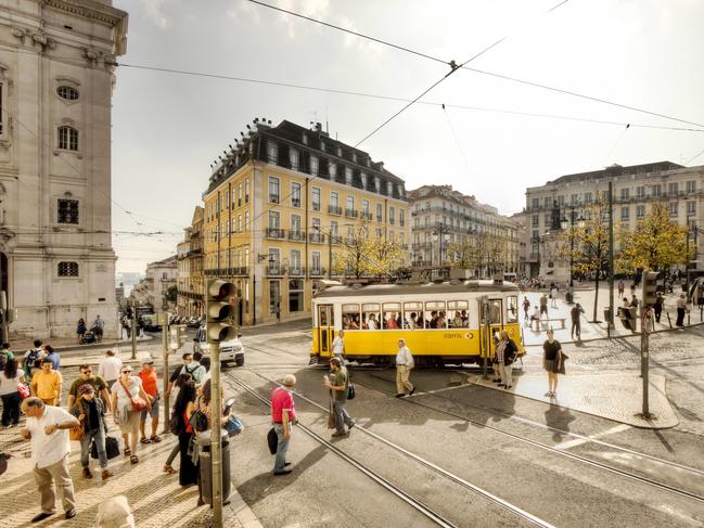 Trams still rumble through the streets of Lisbon.