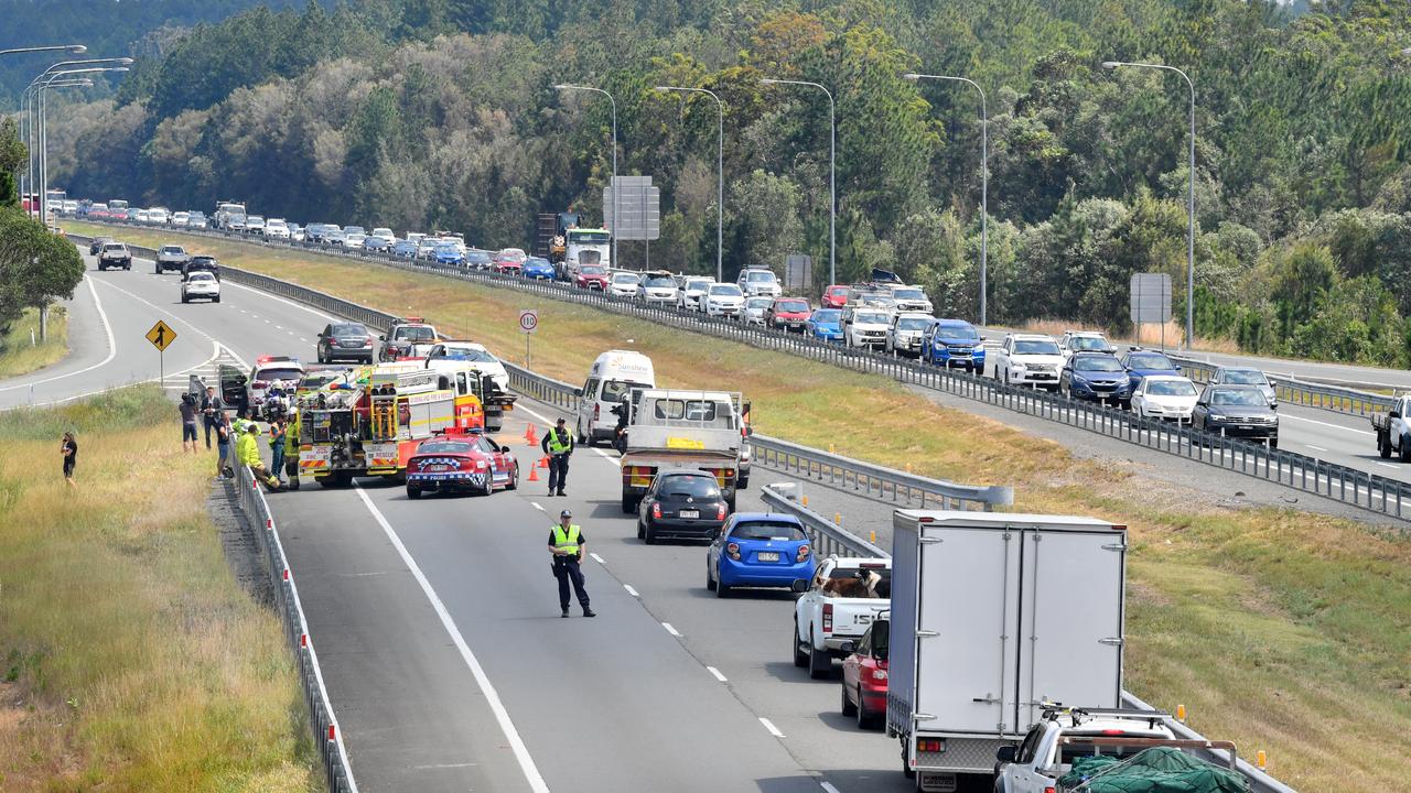 Traffic was banked up on the Bruce Highway after a police chase ended in a dramatic rollover near the Glasshouse Mountains. Photo: John McCutcheon / Sunshine Coast Daily