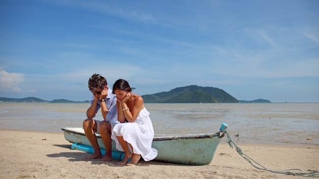 This couple is so disheartened by how much stamp duty they had to pay they are crying on a boat.