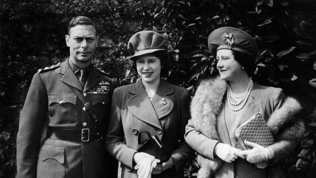 Britain's King George VI, and his wife Elizabeth Bowes-Lyon, the Queen Mother (R) pose with their daughter Princess Elizabeth, as they celebrate her 18th birthday at Windsor Castle.